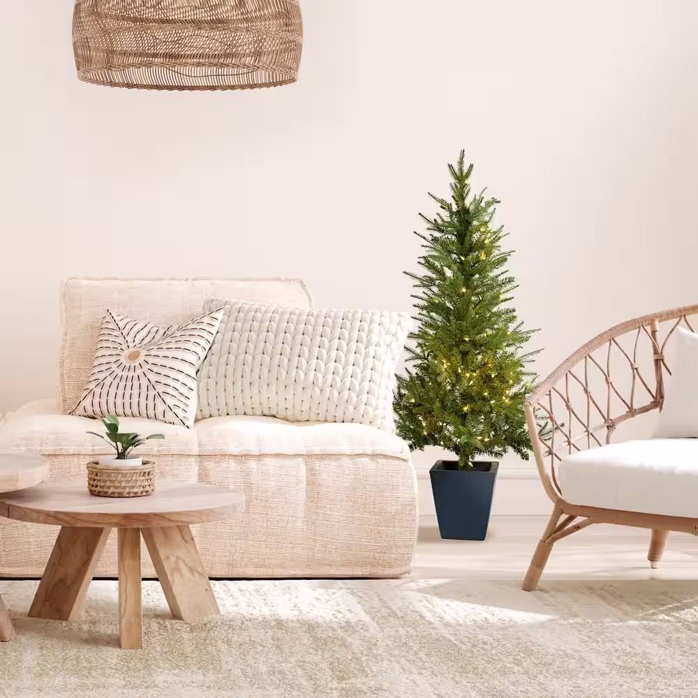 Nearly Natural 4.5 ft. Artificial Christmas Tree with Clear Lights and Decorative Planter