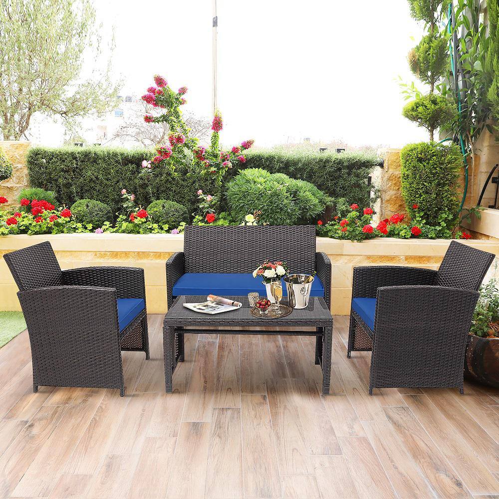 Costway Brown 4-Piece Rattan Furniture Set Patio Conversation Set with Navy Cushions